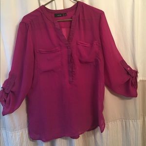 Light weight purple tunic, size large. Apt. 9.